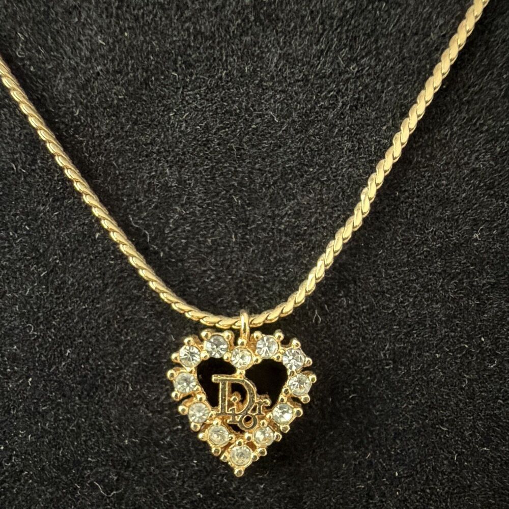 ⁠Vintage Christian Dior Gold Tone Pavé Rhinestone Heart Center CD Logo Necklace⁠